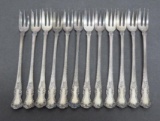 12 sterling fish spoons, 5
