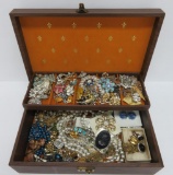Large lot of vintage jewelry, earrings, necklaces, and pins