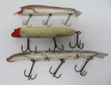 Three vintage wooden fishinhg lures, 7