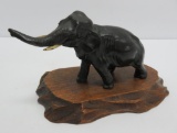 Cast iron elephant figure on wood stand, 7