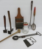 Vintage kitchen utensils and grinder