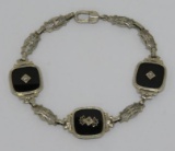 Beautiful reticulated bracelet with inset stones and onyx