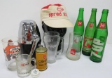 Vintage soda bottles, glasses and Ice O matic ice crusher