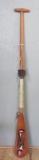 Alaskan Native carved paddle, 58 1/2