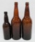 Three embossed Gettelman Brewing Bottles, amber