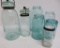 Six blue vintage canning jars and Ann Page storage jar