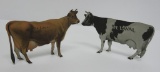 Two metal De Laval cow advertising pieces, 5