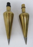 Two brass plumb bobs, 5 1/2