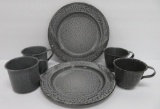 Grey enamelware plates and cups