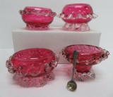 Four Cranberry glass salt cellars and one spoon, 1 1/2