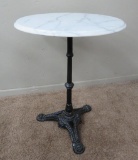 Marble top pub cafe table with cast iron base, 22