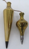 Two brass plumb bobs, 3 1/2