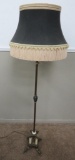 Brass floor lamp with columns and fringe shade, 64