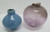 Two vintage lightning rod balls, JFG Blue milk glass and purple