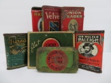 Six tobacco pocket tins and Lucky Strike cigarette tin
