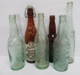 Seven vintage beer bottles, Wisconsin, Schlitz, Miller, Hamm's, Blatz, and Pabst