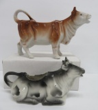 Two German cow creamers, 7
