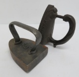 Two antique cast iron sad irons, Troy NY and K & K