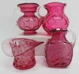 Four vintage cranberry glass pieces, pitchers and vase, 3