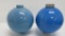 Two blue milk glass lightning rod balls