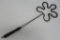 Flower shape rug beater, coiled wire, 23