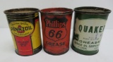 Three Vintage one pound oil cans, Pennzoil, Phillips 66, and Quaker Oil