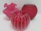 Three cranberry vases, two rose bowls and fluted swirl vase, 4