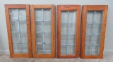 Four matching leaded glass doors, wooden frames, 33