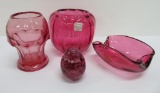 Four pieces of Cranberry glass, vases and paperweight