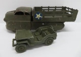 Two toy military vehicles