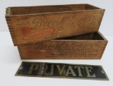 Two wooden Breakstone cheese boxes and metal Private sign
