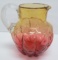Amberina melon shape coin dot pitcher with applied handle, 6 1/2