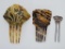 Three vintage hair combs, two plastic and one metal