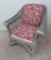 Wicker rocker with upholstered cushions