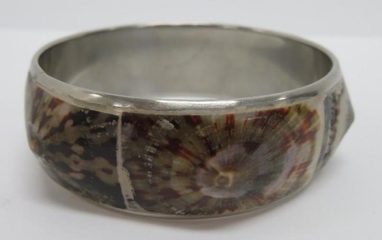 Interesting seashell pattern cuff bracelet, attributed to silver, unmarked