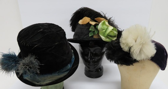 Three vintage velvet hats with feathers and plumes