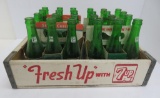 Vintage 7 Up wood crate and four six packs of bottles in cardboard carriers