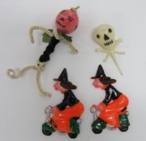 Four vintage Halloween cupcake and cake decorations