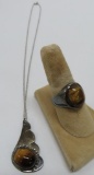 Tiger eye men's ring and necklace, both marked 
