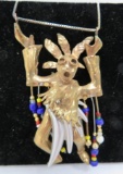Interesting articulating Native American dancer pendant, 3