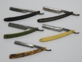 Five vintage folding straight razors