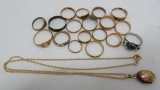 Large lot of 19 baby rings and locket, some silver and gold