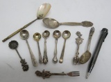 Assorted spoon pins and mechanical pencil