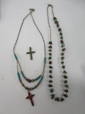Turquoise and coral necklaces and crosses