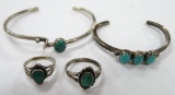 Two cuff bracelets and two rings, turquoise