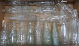 18 embossed soda bottles
