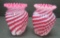 Two ribbed cranberry swirl vases, 5