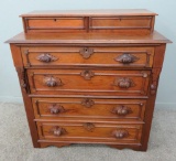 Four drawer Walnut Dresser with carved nut drawer pulls