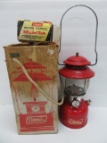Red Coleman lantern with box and funnel, Model 200A, 12