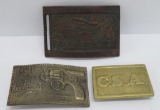 Three belt buckles, CSA, E Pluribus Onum, and Marksmen of the Year